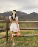 Flytonn- White Lace Bowknot Puff Sleeve Tiered Dress